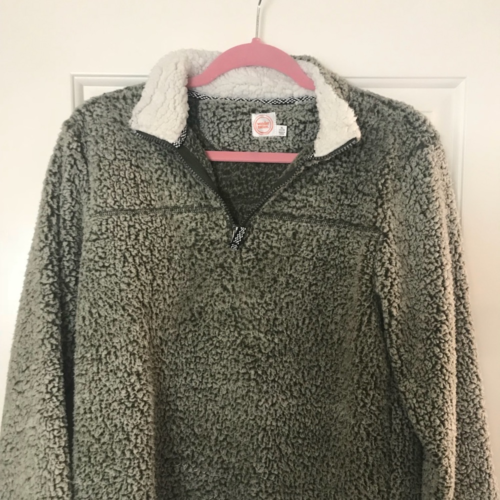 Green Sherpa sweater.